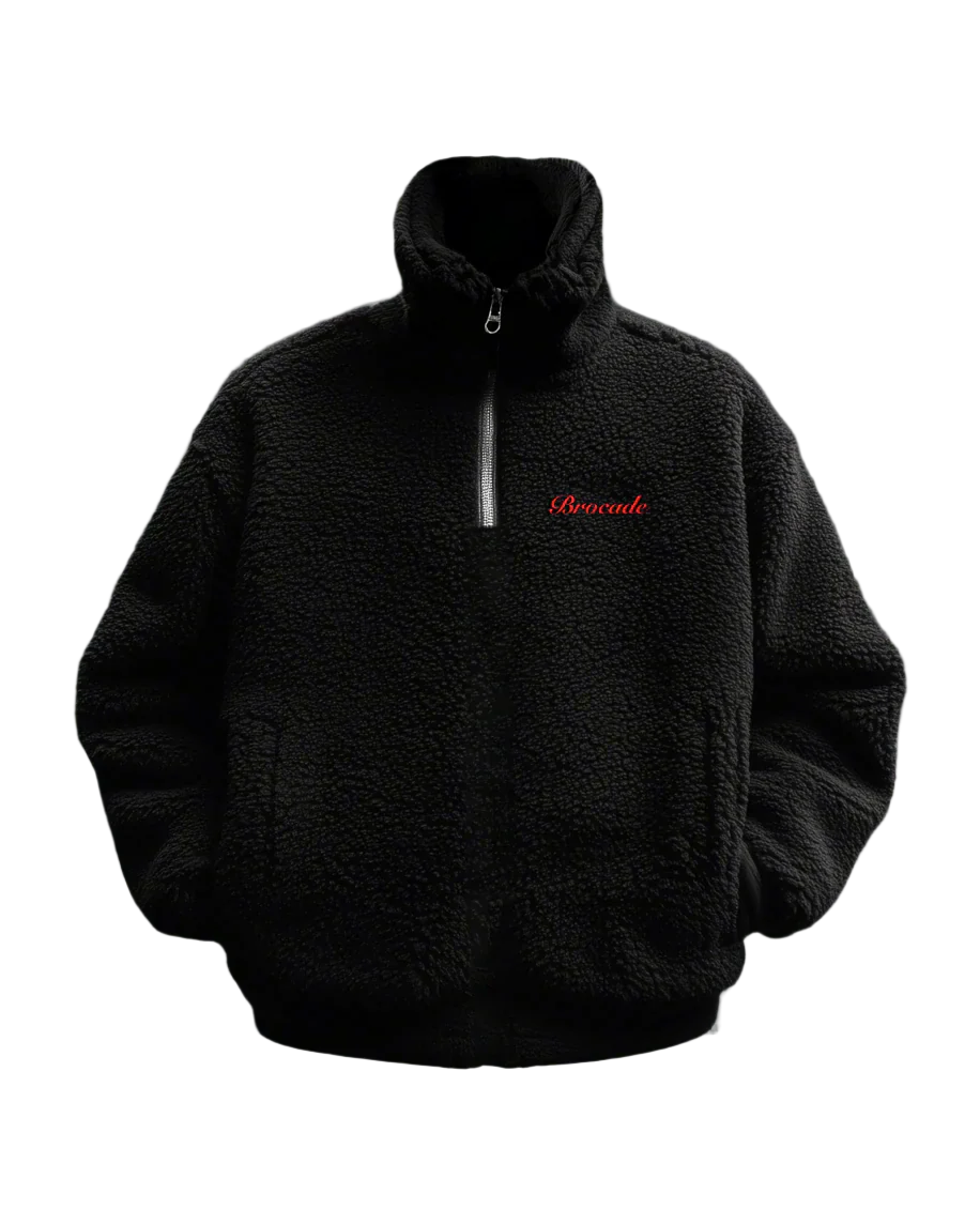 A black fur pullover with a half-zip design and high collar, featuring red embroidered text on the front.